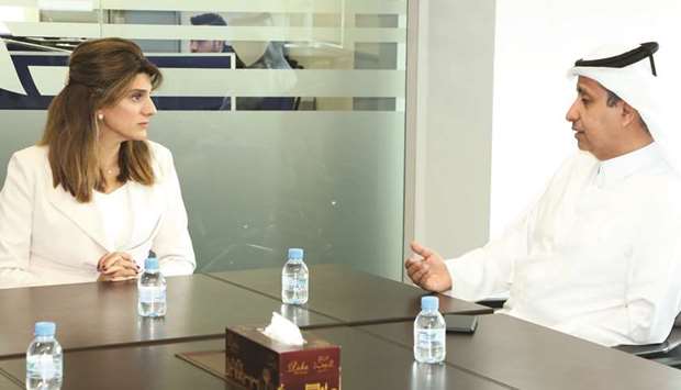 Princess Dina Mired of Jordan in discussion with Qatar Cancer Society chairman Sheikh Dr Khalid bin Jabor al-Thani.