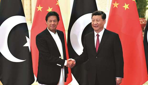 Prime Minister Imran Khan with Chinau2019s President Xi Jinping before a meeting yesterday at the Great Hall of the People in Beijing.