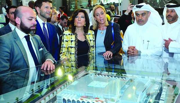 HE the Minister of Commerce and Industry Ali bin Ahmed al-Kuwari, the Italian Senate President Maria Elisabetta Casellati and other dignitaries visiting Ashghal's stall at Project Qatar 2019.  PICTURES: Ram Chand.