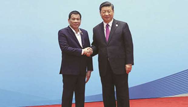 Photo taken on April 27 shows President Rodrigo Duterte being received by China President Xi Jinping prior to the start of the Leadersu2019 Roundtable Discussion in the second Belt and Road Forum for International Co-operation in China.