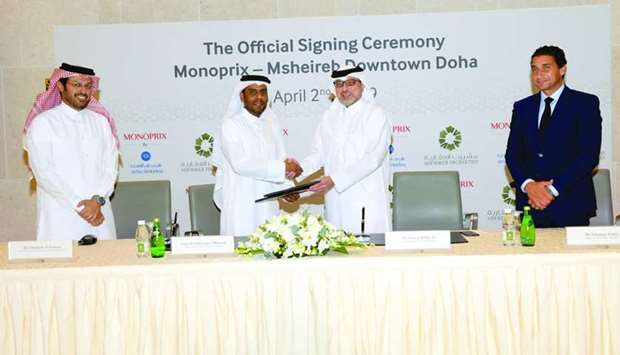 Ali al-Kuwari and Nabeel Ali Bin Ali led the agreement signing Wednesday for the establishment of a u2018digitally smartu2019 Monoprix at Msheireb Downtown Doha. PICTURE: Thajudeen.
