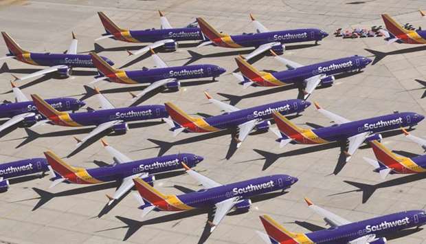 Southwest Airlines Boeing 737 MAX aircraft are parked on the tarmac after being grounded, at the Southern California Logistics Airport in Victorville (file). A preliminary Ethiopian report into the disaster of a doomed Ethiopian jet is due to be published within days and may include evidence the software system kicked in as many as four times before the 737 MAX dived into the ground, two people with knowledge of the matter say.