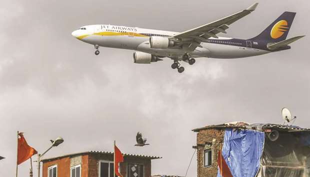 A Jet Airways aircraft prepares to land at Chhatrapati Shivaji International Airport in Mumbai (file). Lessors to the airline are planning to ask Indiau2019s aviation regulator to de-register many more planes leased to the airline, three sources said, signalling a planned bailout of the debt-laden carrier is failing to assuage their concerns.