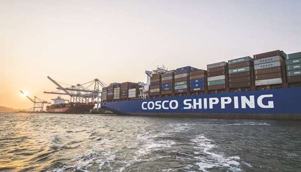 Shipping containers sit on a ship at the Port of Oakland in Oakland, California (file). Both the US and Chinese officials have projected cautious optimism on reaching a trade agreement for months, but the last mile is proving to be the hardest, with the two sides reportedly tussling over whether and when Washington should remove the punishing tariffs it imposed last year on Chinese goods.