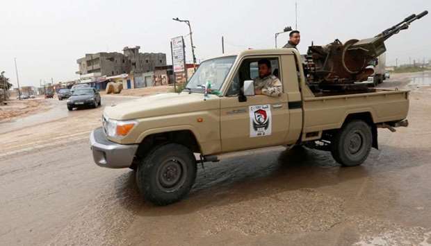 A military vehicle of Misrata forces, under the protection of Tripoli's forces, is seen on the road of Wadi al Rabih south of Tripoli