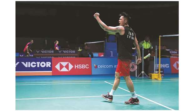 Lin Dan of China celebrates winning the menu2019s singles semi-final match against Shi Yuqi of China at the Malaysia Open badminton tournament in Kuala Lumpur yesterday.