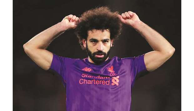 Liverpoolu2019s Mohamed Salah celebrates scoring their second goal against Southampton on Friday. (Reuters)
