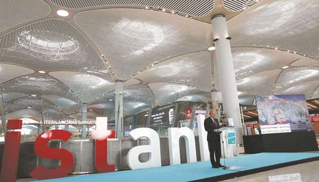 Turkish Transport Minister Cahit Turhan speaks to media at the departure terminal of the Istanbul International Airport in Istanbul on Wednesday. The $8bn airport is one of several infrastructure mega-projects championed by President Recep Tayyip Erdogan and will initially be able to handle 90mn passengers a year, a number which Turkey hopes to more than double by 2027.