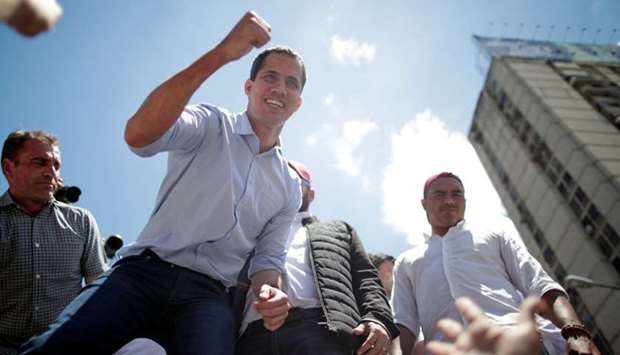 Venezuelan opposition leader Juan Guaido, who many nations have recognized as the country's rightful interim ruler, attends a rally against Venezuelan President Nicolas Maduro's government in Caracas, Venezuela