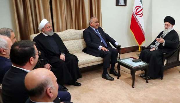 Iran's Supreme Leader Ayatollah Ali Khamenei meeting with Iraqi Prime Minister Adel Abdel Mahdi (L) in the presence of President Hassan Rouhani in the Iranian capital Tehran. AFP PHOTO/HO/KHAMENEI.IR