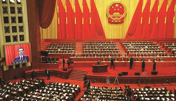 File photo of Chinese Premier Li Keqiang addressing delegates during the opening session of the National Peopleu2019s Congress (NPC) at the Great Hall of the People in Beijing.