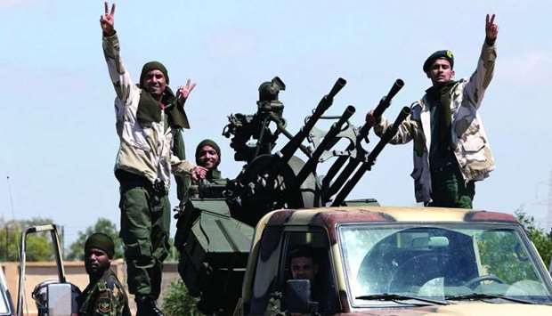 Libyan National Army (LNA) members, commanded by Khalifa Haftar, head out of Benghazi to reinforce the troops advancing to Tripoli, in Benghazi, Libya April 7, 2019. REUTERS/Esam Omran Al-Fetori