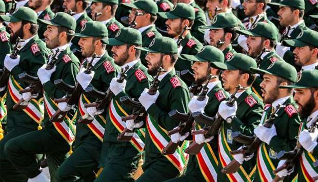 Members of Iran's Revolutionary Guards Corps (IRGC) march during a military parade