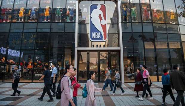 People walk by the NBA flagship retail store on October 9, 2019 in Beijing, China. (TNS)