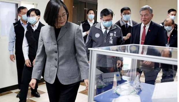 Taiwanese president Tsai Ing-Wen visits a non woven filter fabric factory, where the fabric is used to make surgical face masks, in Taoyuan, Taiwan on March 30