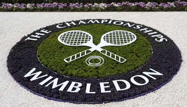 A Wimbledon logo is seen inside the grounds at the Wimbledon tennis championships in London