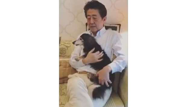 Abe's video, which featured his pet dog, was a response to popular musician Gen Hoshino, who uploaded a video of himself singing about dancing indoors and invited people to collaborate.