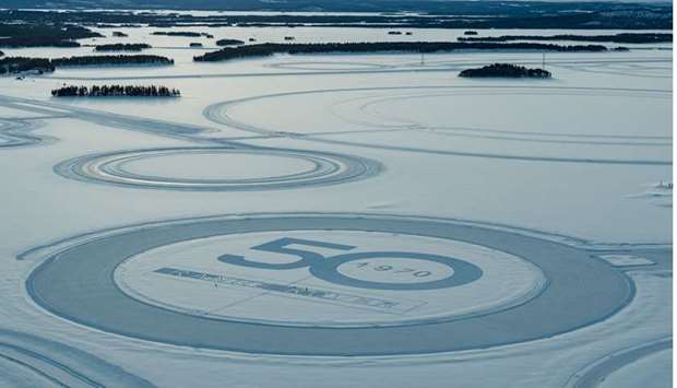Land Rover begins 50th anniversary celebrations for the original luxury SUV with a snow art installation at its Arjeplog cold weather test facility in Sweden and world heavyweight champion Anthony Joshua.