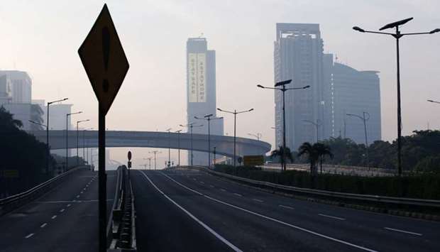 A general view of a deserted main road during the imposition of large-scale social restrictions by the government to prevent the spread of the coronavirus disease (Covid-19) in Jakarta, Indonesia