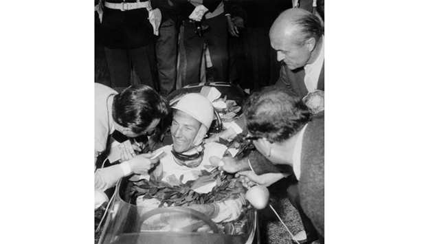 In this May 15, 1961, picture, Stirling Moss is pictured after winning the Monaco Grand Prix. (AFP)