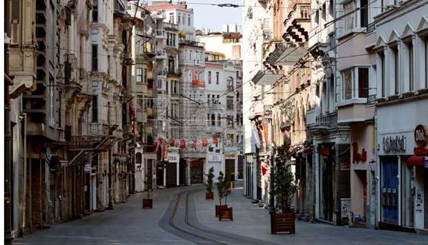A general view shows the deserted Istiklal Street during a two-day curfew which was imposed to prevent the spread of the coronavirus disease, in Istanbul, Turkey on, April 11