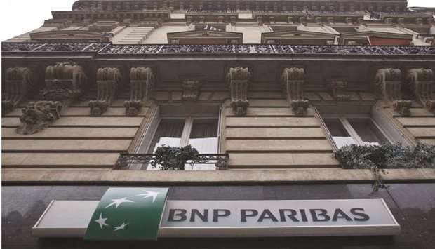 The logo of BNP Paribas sits outside a branch of the bank in Paris. BNP Paribas and Credit Agricole are offering the eurozoneu2019s first new senior bank bonds for two months with market stress from the coronavirus starting to ease in both Europe and Asia.