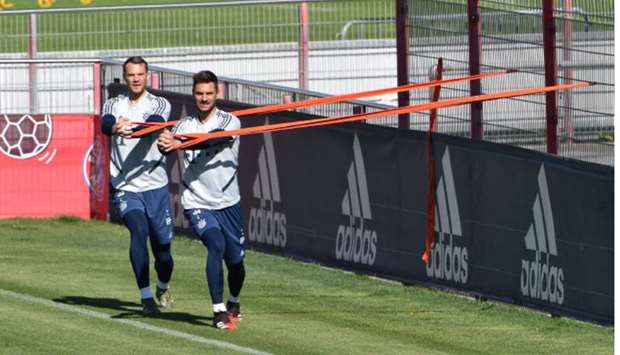 Bayern Munichu2019s goalkeepers Manuel Neuer (left) and Sven Ulreich train in Munich. (AFP)