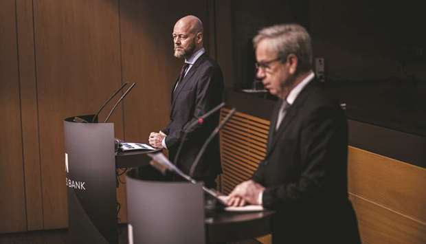 Yngve Slyngstad, CEO of Norges Bank Investment Management (left), pauses as Oystein Olsen, governor of Norwayu2019s central bank, speaks at a news conference in Oslo on February 27.