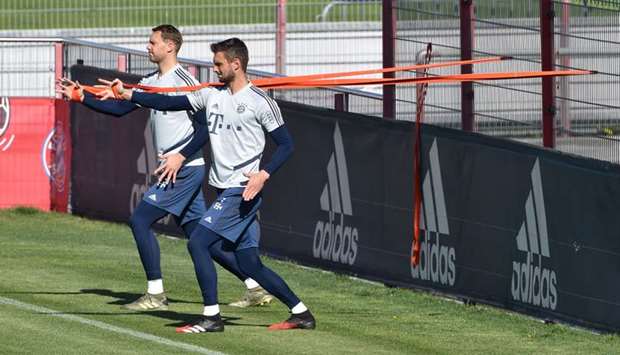 Bayern Munichu2019s goalkeepers Manuel Neuer (left) and Sven Ulreich take part in a training session in Munich, Germany, on Thursday. (AFP)