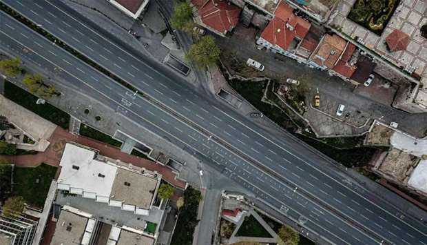 Empty road leading to the golden horn in Istanbul, as Turkish government announced a two-day curfew to prevent the spread of the epidemic COVID-19 caused by the novel coronavirus.