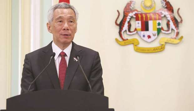 Lee Hsien Loong, Singaporeu2019s Prime Minister, speaks during a news conference in Putrajaya, Malaysia.