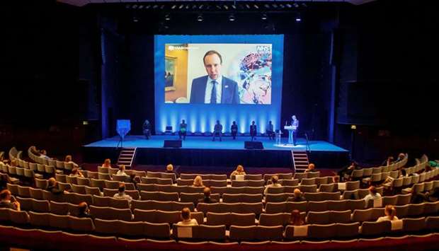 Health Secretary Matt Hancock gives a message via video-link at the opening of the NHS Nightingale Hospital, Yorkshire, and the Humber hospital in Harrogate, North Yorkshire, yesterday.