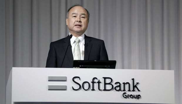 Masayoshi Son, chairman and chief executive officer of SoftBank Group, speaks during a news conference in Tokyo. The Japanese firm announced a plan to buy up to u00a5500bn of its stock over the next year.