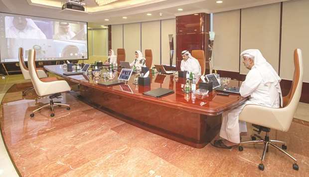 UDC officials engaged in a video conference meeting.