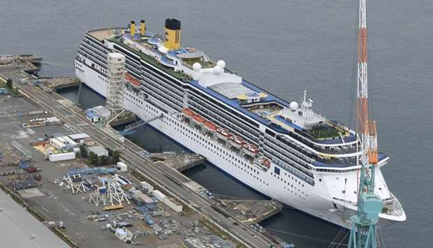 An aerial view shows Italian cruise ship Costa Atlantica in Nagasaki, southern Japan on April 21