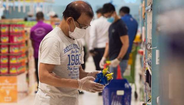 During a visit to a couple of hypermarkets on Sunday, Gulf Times lensmen saw people abiding by the rule even as PICTURES: Jayan Orma and Noushad Thekkayil