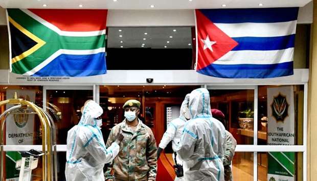 Cuban Health Specialists arriving at the Waterkloof Air Force Base in Pretoria, South Africa, to support efforts to curb the spread of the COVID-19. AFP /GCIS/ELMOND JIYANE