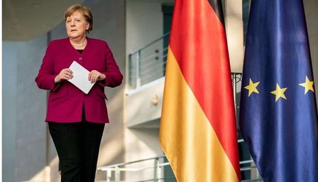 German Chancellor Angela Merkel arrives to address a press conference at the Chancellery in Berlin on April 23.