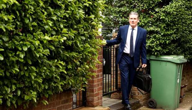 Britain's Labour Party leader Keir Starmer leaves his home in London