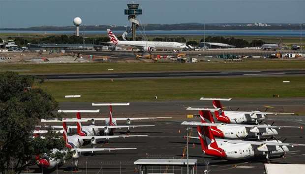 Grounded aircraft operated by Virgin Australia Holdings stand on the tarmac at Sydney Airport.