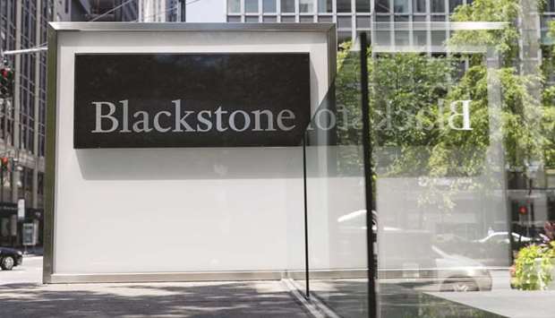 A signage is displayed outside the Blackstone Group headquarters in New York.