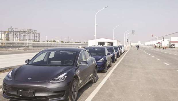 Tesla Model 3 vehicles sit parked at the companyu2019s Gigafactory in Shanghai. China is a centerpiece of Tesla chief executive officer Elon Musku2019s automotive ambitions. The company began delivering China-built Model 3s to local consumers in January.