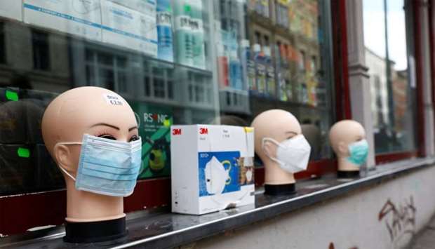 Masks are displayed at a general store, during the outbreak of the coronavirus disease (COVID-19), in the Kreuzberg district of Berlin, Germany