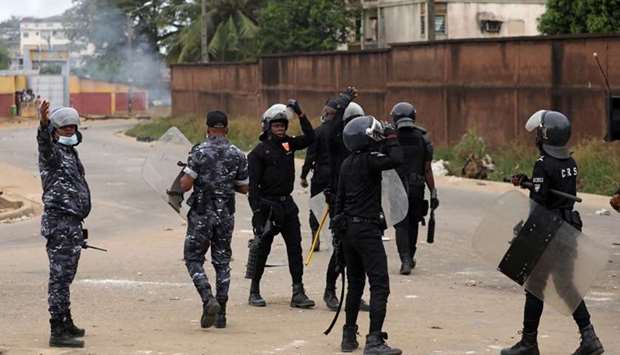 Riot police are seen as they try to stop protesters who ransacked a half-built makeshift hospital for the coronavirus disease (COVID-19) treatment, as they say its location is too close to a local community, in Yopougon, Abidjan, Ivory Coas