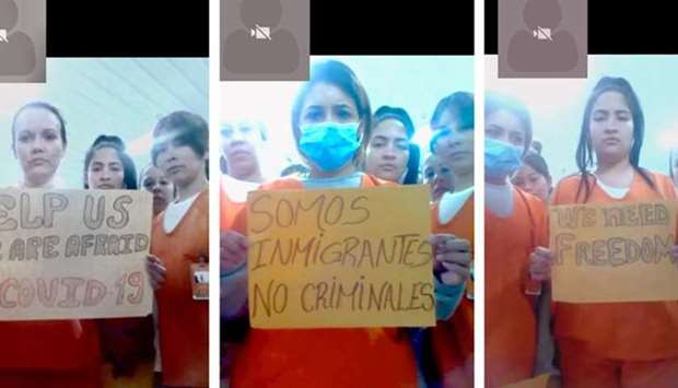 Migrants detained in an ICE detention facility in Basile, rural Louisiana, US, display signs related to coronavirus disease (Covid-19) in this combination of screenshots taken during a video conferencing call.