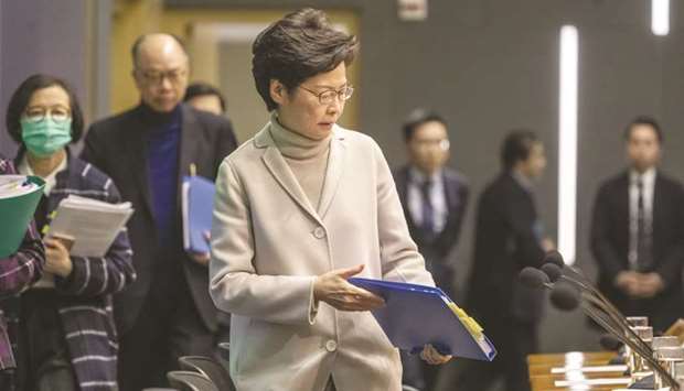 Carrie Lam, Hong Kongu2019s chief executive, arrives at a news conference in Hong Kong.