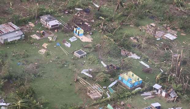 Damaged houses in the aftermath of Tropical Cyclone Harold