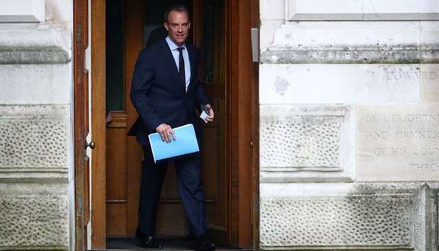 Foreign Secretary Dominic Raab arrives in Downing Street, London, as the spread of the coronavirus disease continues.