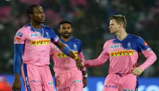 Rajasthan Royals captain Steve Smith (right) with his teammates Jofra Archer (left) during an IPL match. (AFP)