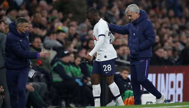 In this February 5, 2020, picture, Tottenham Hotspur manager Jose Mourinho (right) substitutes Tanguy Ndombele during the FA Cup match against Southampton in London, United Kingdom. (Reuters)